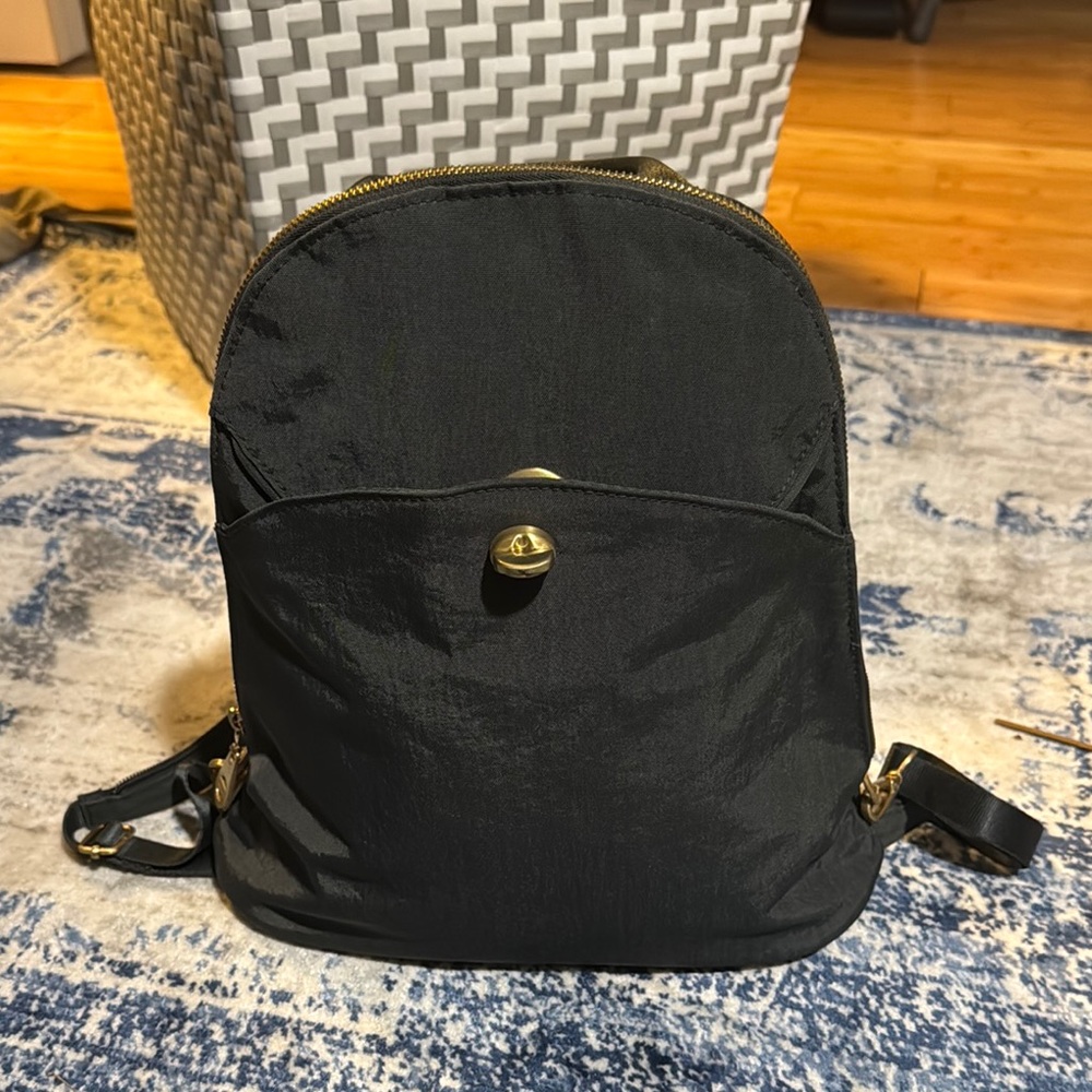 Black Backpack with Gold Accents